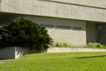 Thompson Conference Center building exterior with building sign